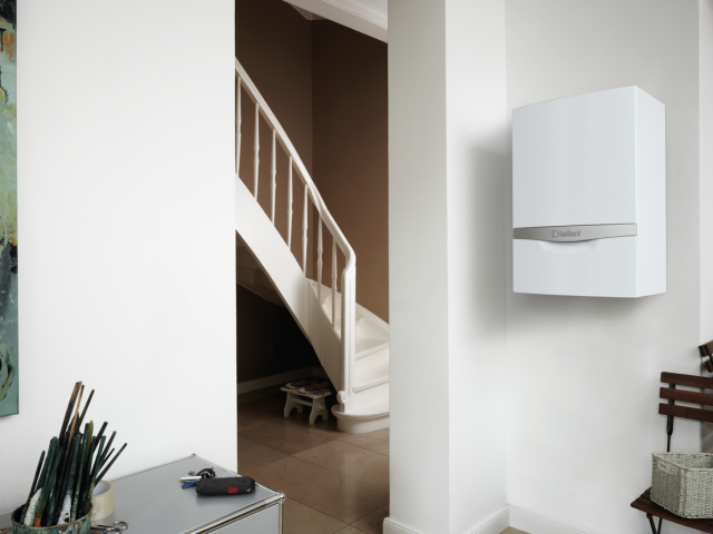 Boiler mounted in a hallway cupboard